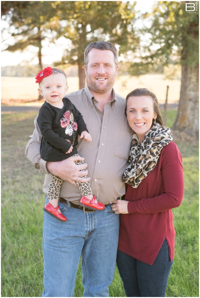 Nacogdoches photographer fall family and 1 year portrait session in a sunlit field 