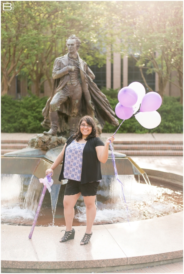 Nacogdoches photographer senior portraits on SFA campus with purple & white balloons